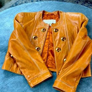 Escada vintage jacket.  Leather is super soft.  It has one scar h.